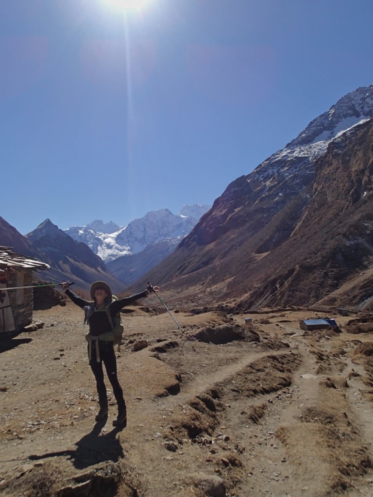 Photo of a woman trekking a mountain